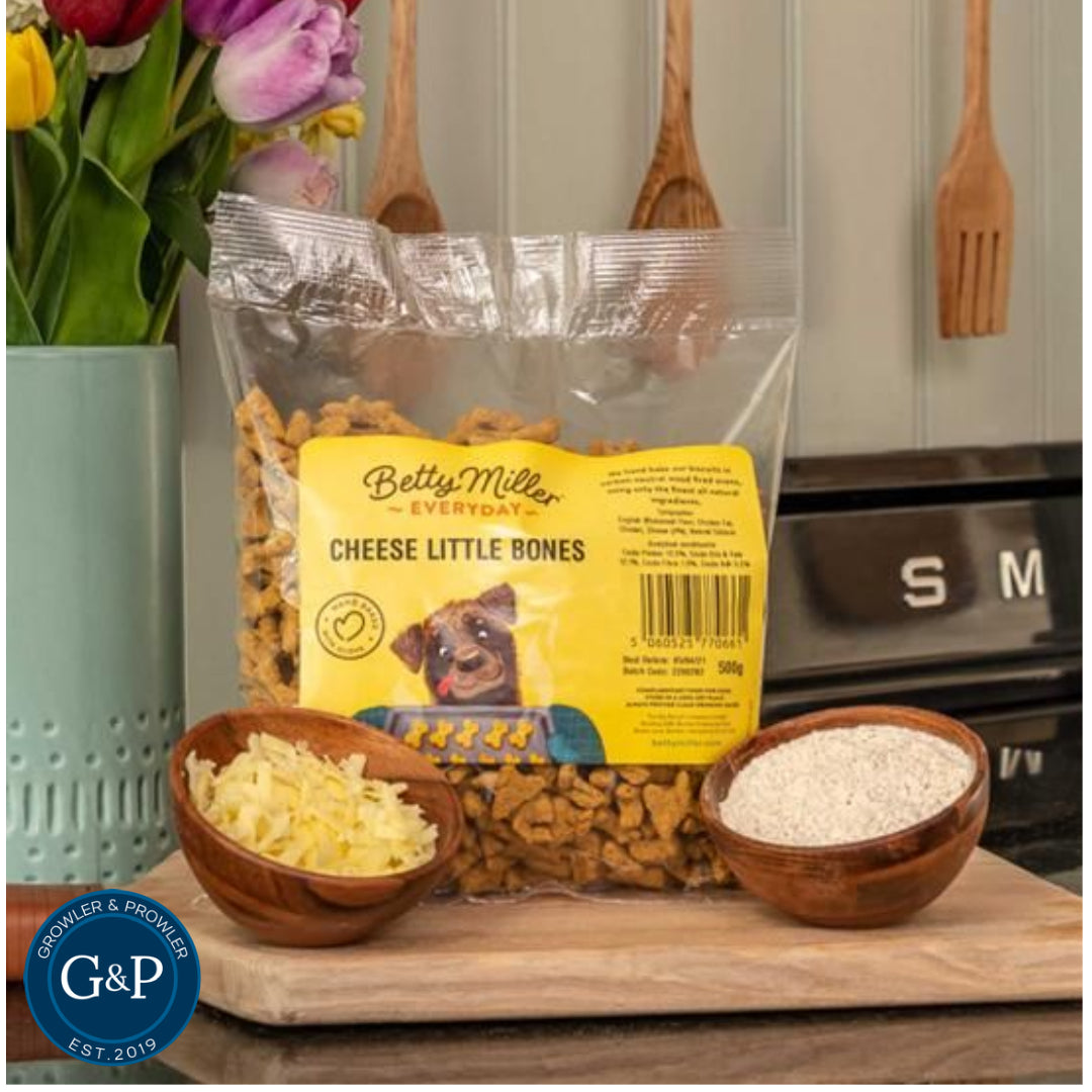 Photo of a packet of Betty Miller Cheese Little Bones dog treats, a natural and crunchy cheese-flavoured snack for dogs available at Growler and Prowler in Manchester