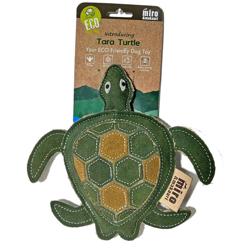 A green turtle-shaped dog toy made with natural materials. Ideal for fetching, tugging, and keeping dogs entertained.