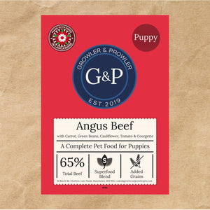 A bag of Superfood Puppy Angus Beef dog food from Growler and Prowler, featuring 65% Angus beef and a variety of fresh vegetables.